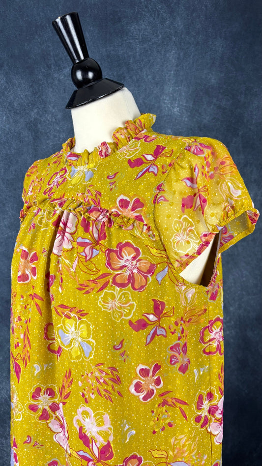 Blouse florale colorée Joie, taille medium. Vue de l'encolure.