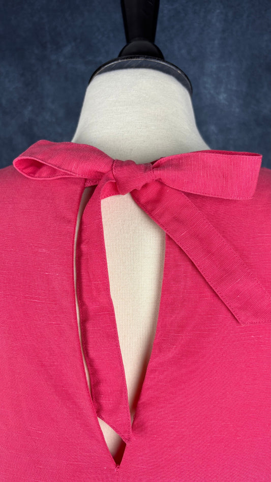 Chandail coupe carrée rose melon Tristan, taille large. Vue de la boucle au haut du dos.