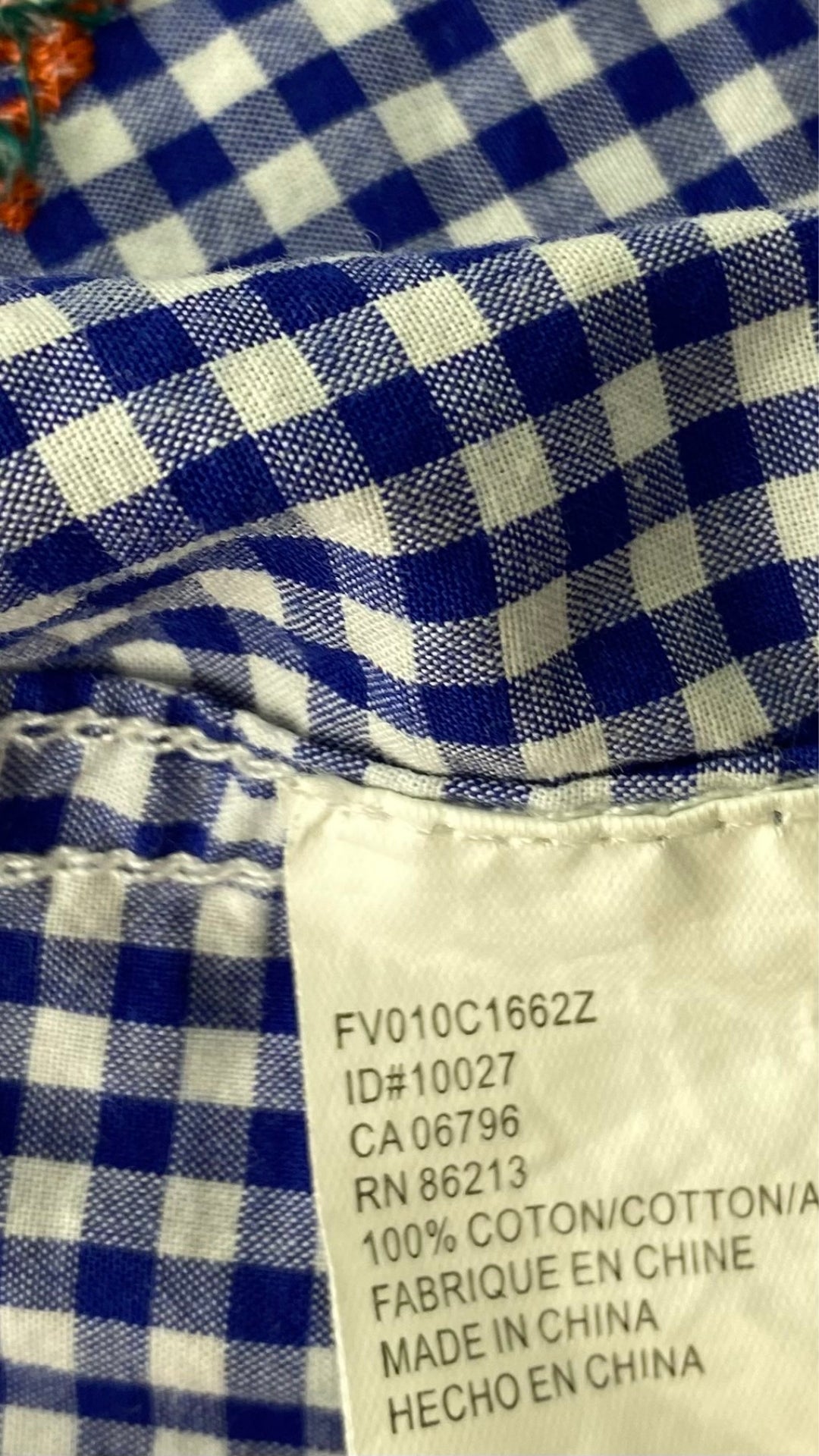 Chemisier vichy avec broderies de fleurs Tristan, taille xs. Vue de l'étiquette de composition.