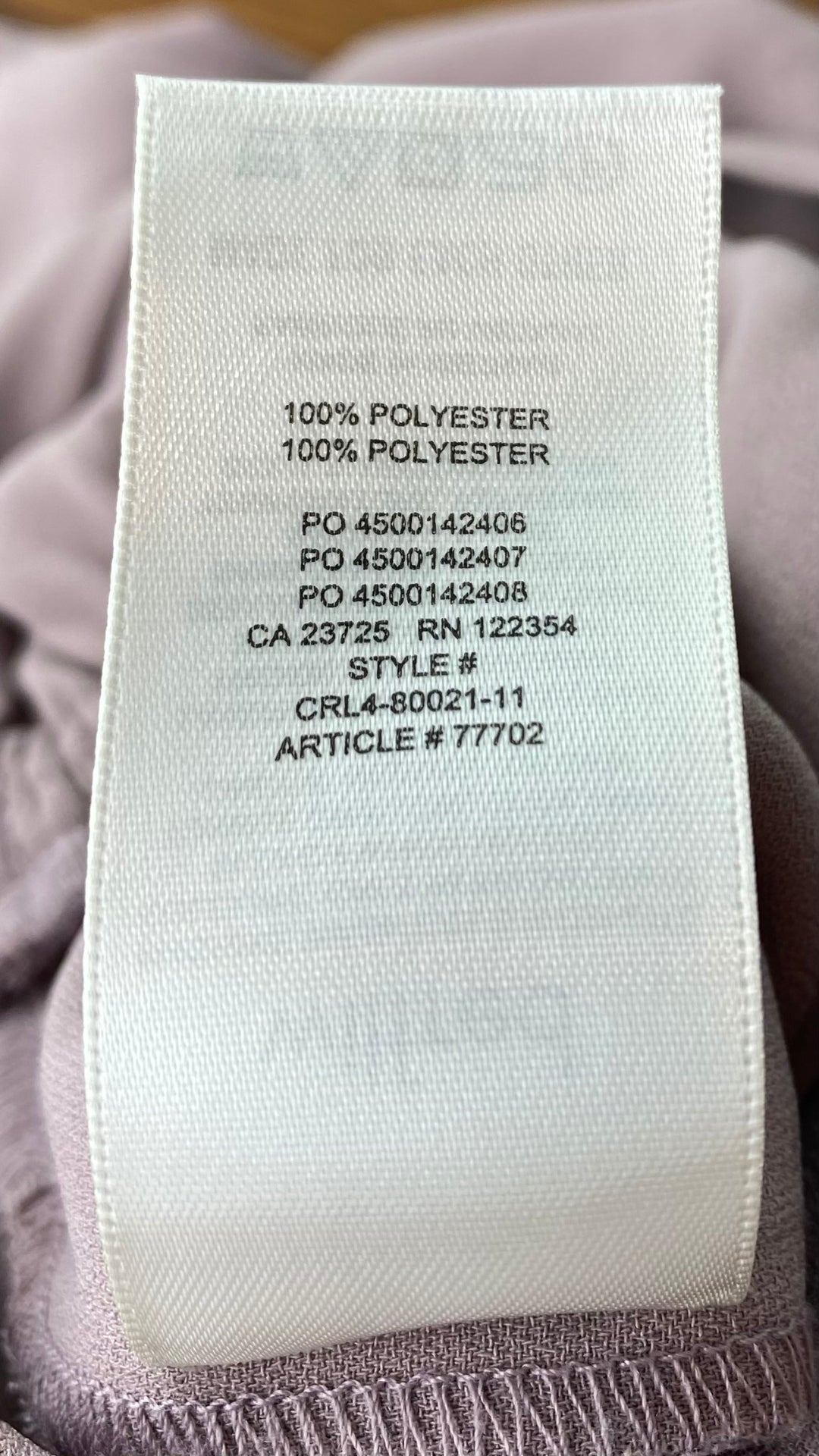 Combinaison haut cache coeur et jambes larges Wilfred chez Aritzia, taille medium. Vue de l'étiquette de composition.