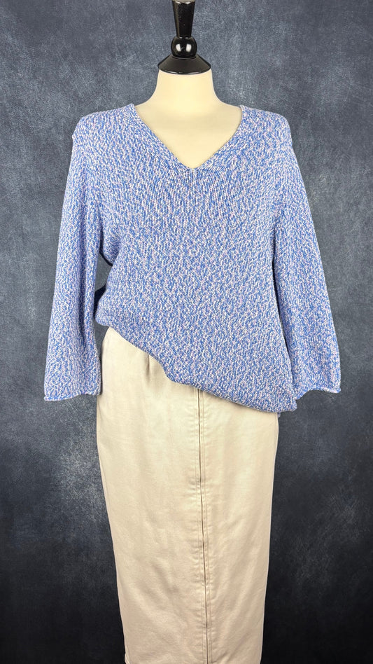 Jupe midi crème avec longue fermeture à glissière centrale à double curseur Harly Jae, taille medium. Vue de l'agencement avec le tricot Olsen pastel.