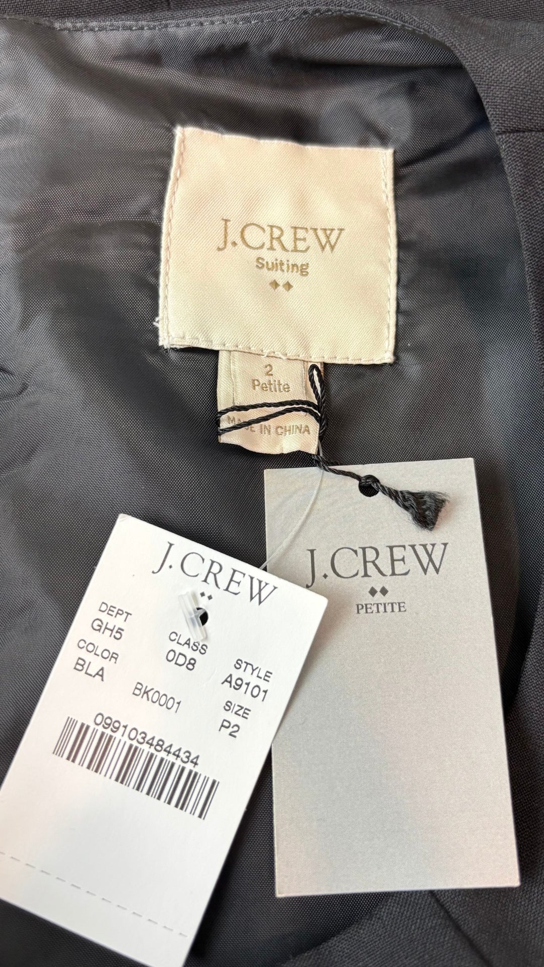 Robe noire parfaite en fin lainage J.Crew neuve, taille 2 petite. Vue de l'étiquette.
