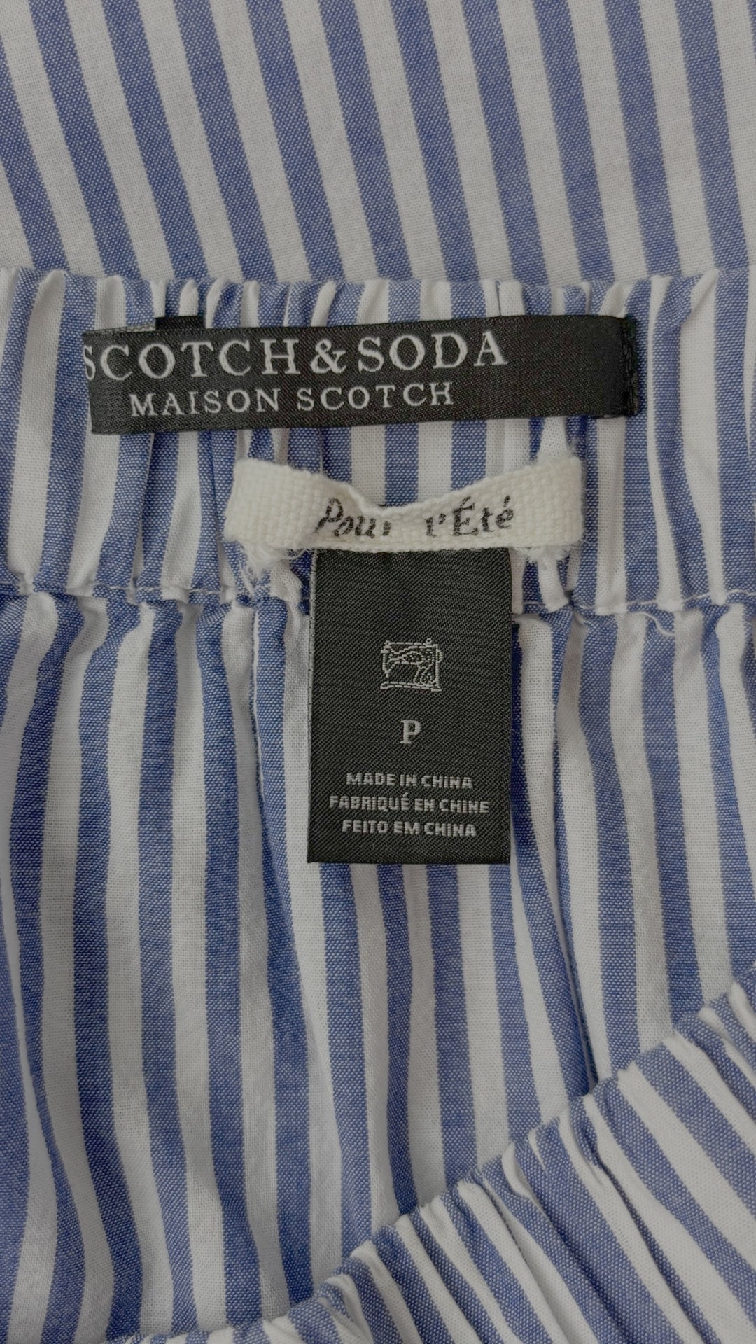 Blouse à rayures et épaules dégagées Scotch & Soda, taille small. Vue de l'étiquette.