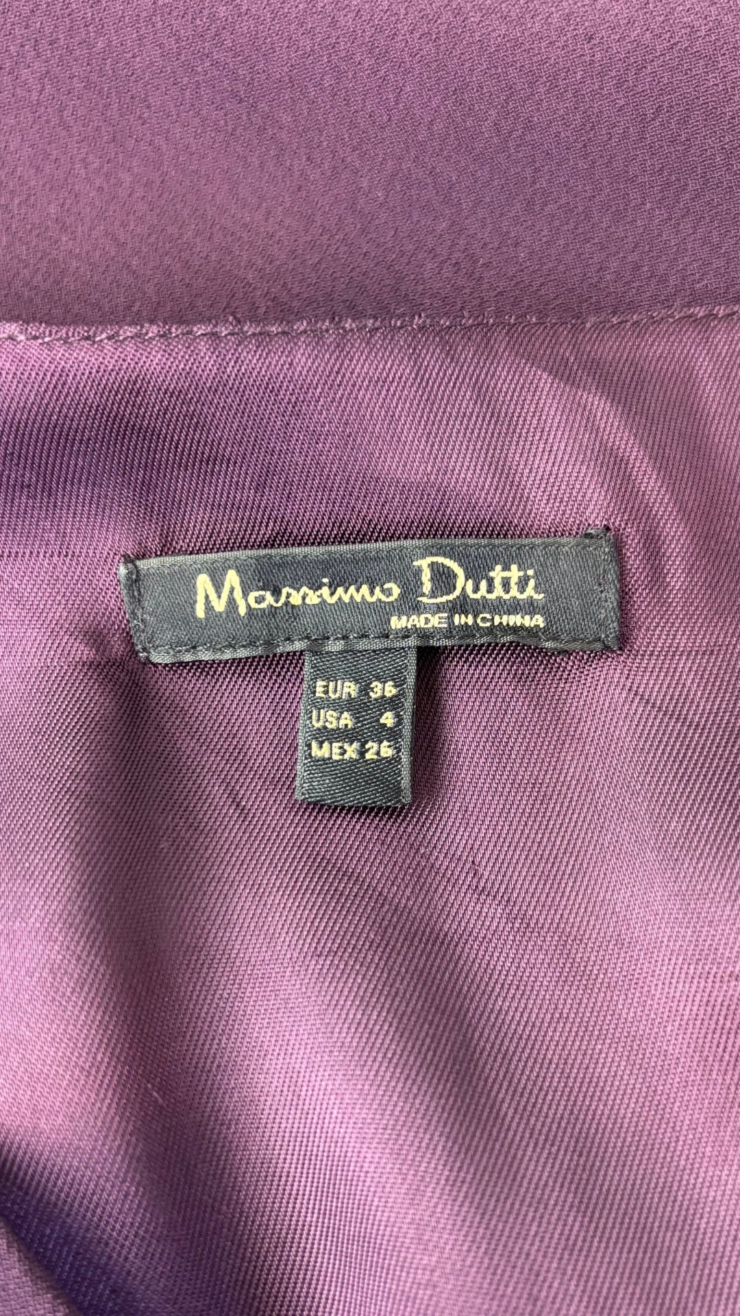 Combinaison prune Massimo Dutti, taille 4 (xs). Vue de l'étiquette.