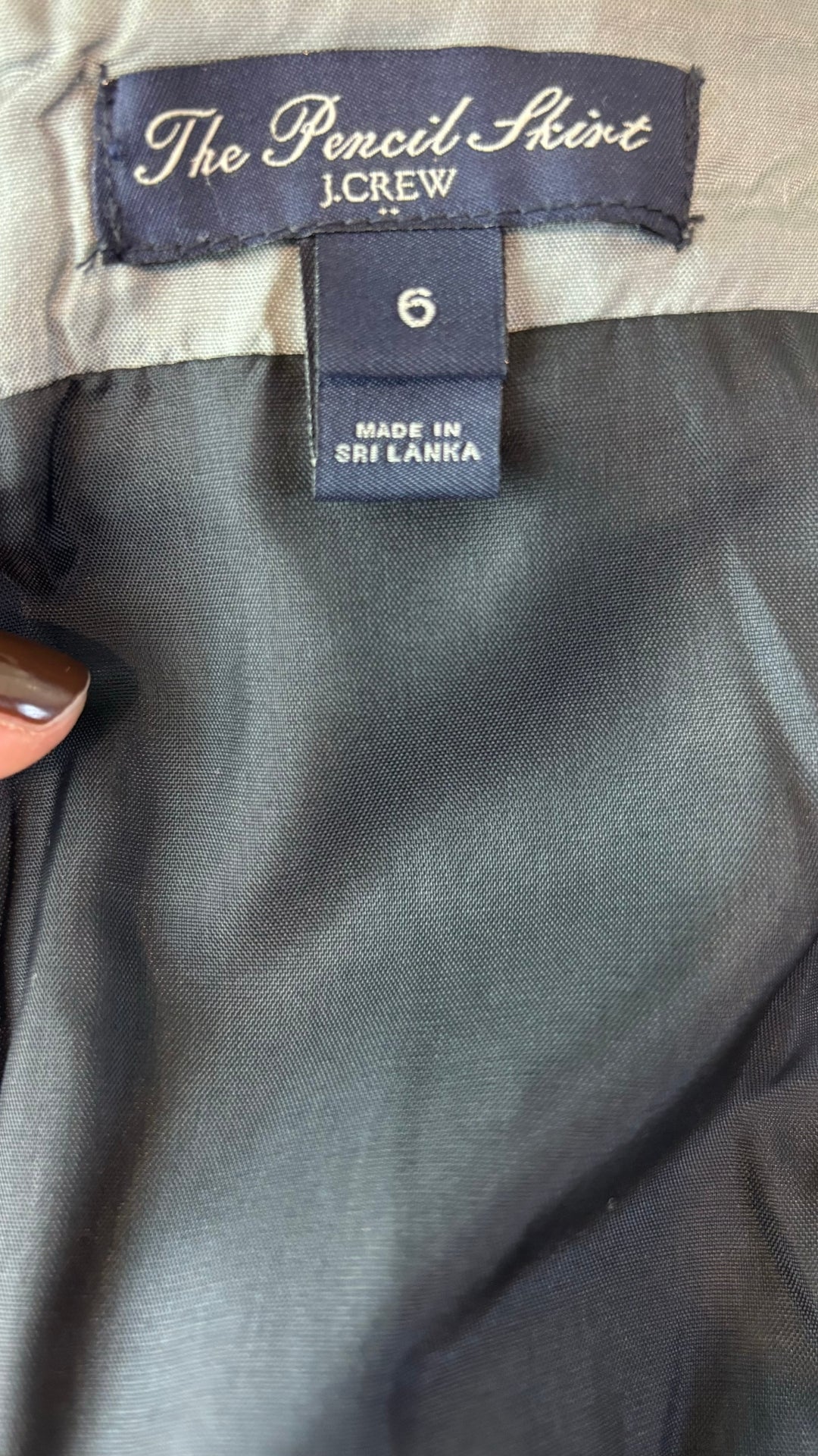 Jupe crayon noire en mélange de laine J.Crew, taille 6. Vue de l'étiquette.