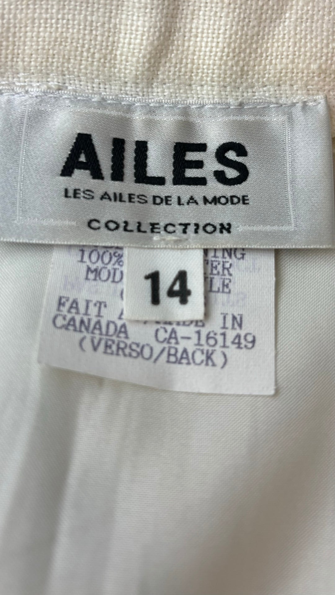 Jupe crème en lin Les Ailes de la Mode, taille 14 (l). Vue de l'étiquette de marque, taille et composition.