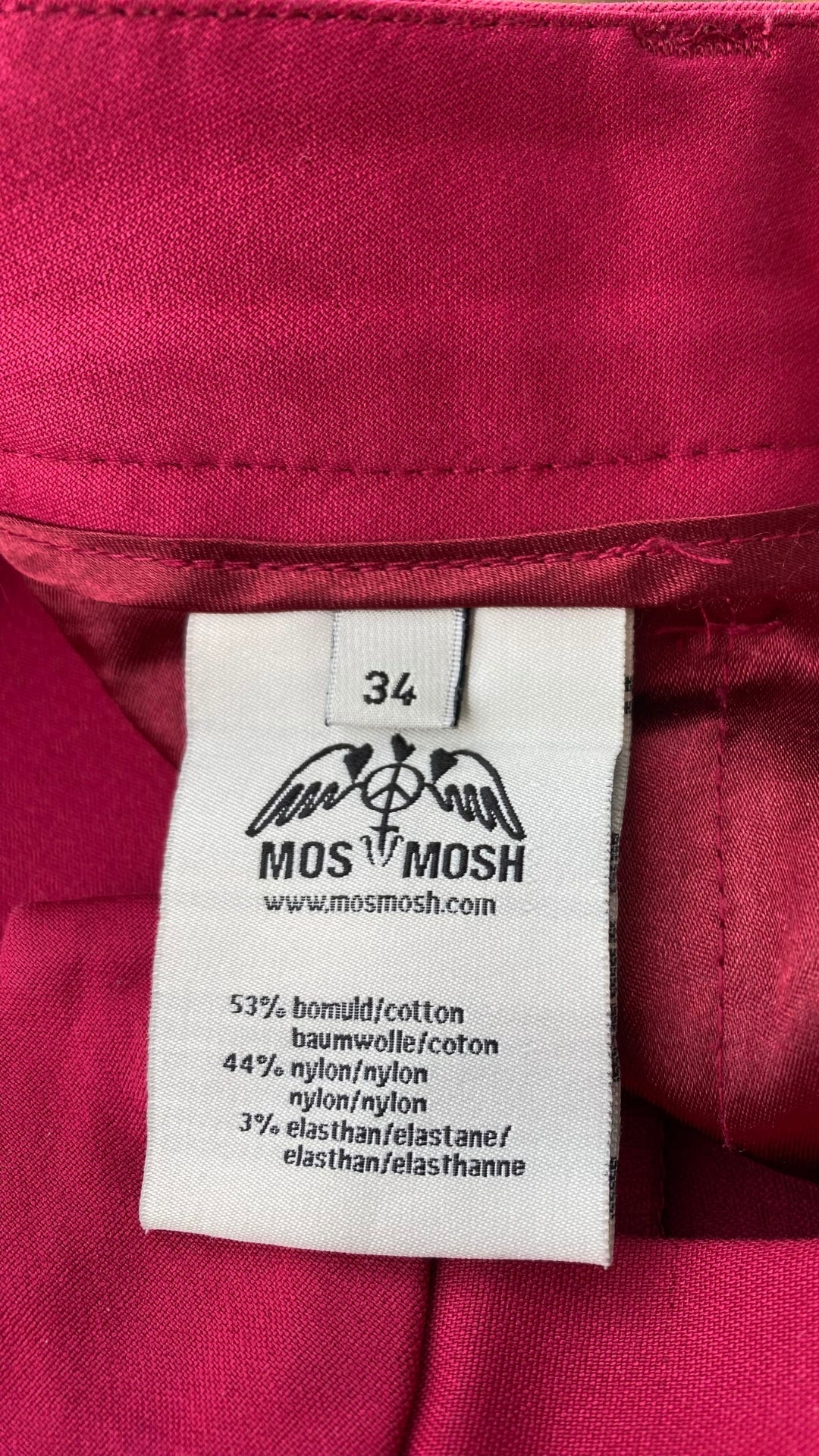 Pantalon écourté rose cerise Mos Mosh, taille 34 (européen - 25-xs). Vue de l'étiquette de taille et composition.