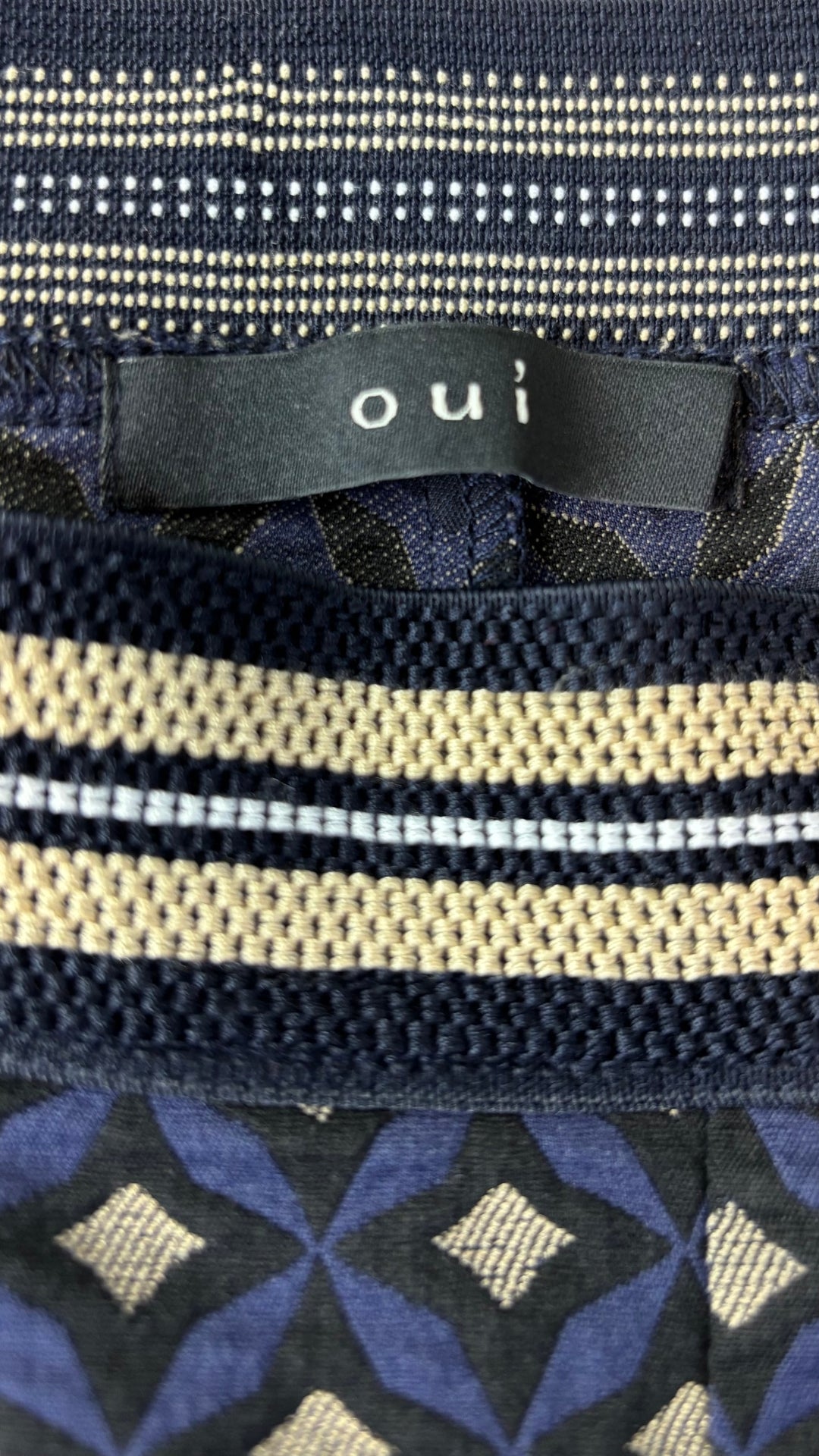 Pantalon jacquard à motifs marine et jaune Oui, taille 12. Vue de l'étiquette.