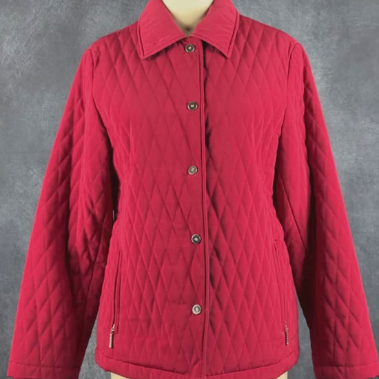 Manteau rouge matelassé Liz Clairborne, taille xs/s. Vue de la vidéo qui présente tous les détails du manteau.