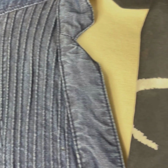 Robe en chambray avec poches et plissé à la poitrine Gerard Darel, taille 40 (m). Vue de la vidéo qui présente tous les détails de la robe.