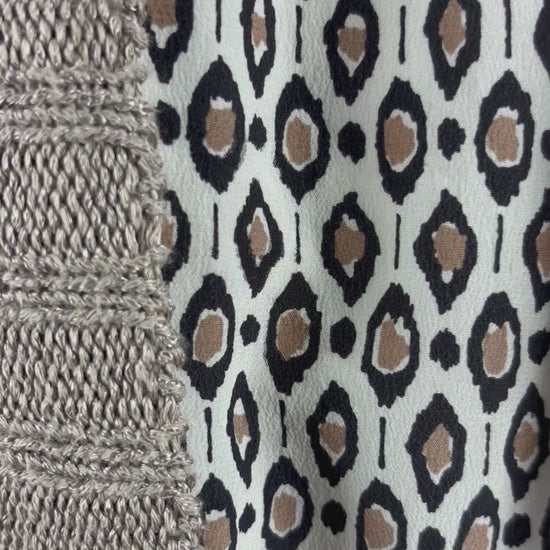 Veste longue en tricot beige Filippa K, taille medium. Vue de la vidéo qui présente tous les détails de la veste.