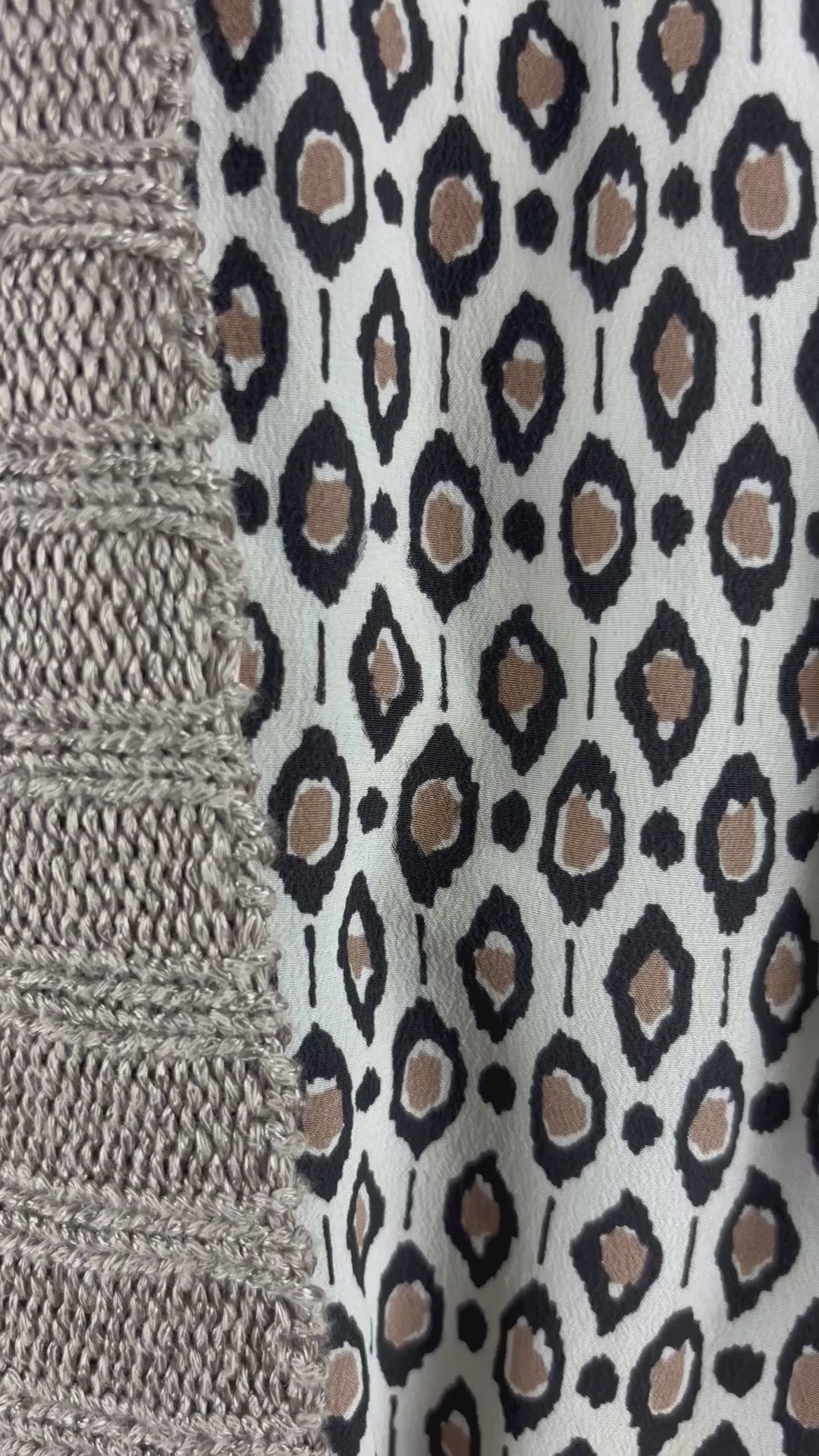 Veste longue en tricot beige Filippa K, taille medium. Vue de la vidéo qui présente tous les détails de la veste.