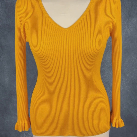Chandail fin tricot soie et coton jaune safran Massimo Dutti, taille medium. Vue de la vidéo qui présente tous les détails du chandail.