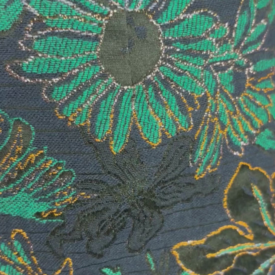 Jupe droite en jacquard floral superbe Tristan, taille 10. Vue de la vidéo qui présente tous les détails de la jupe et ses agencements.