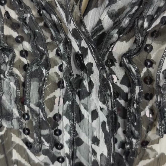 Chemisier diaphane à motif animalier Gerry Weber, taille 8. Vue de la vidéo qui présente tous les détails de la blouse.
