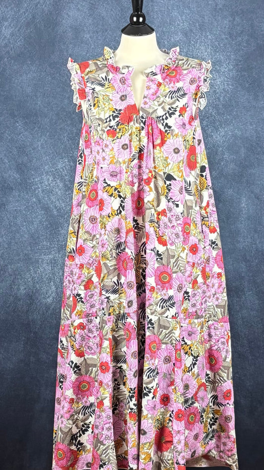 Robe longue ample fleurie en coton avec poches, fabriquée en Italie, Chepè, taille medium. Vue de face.