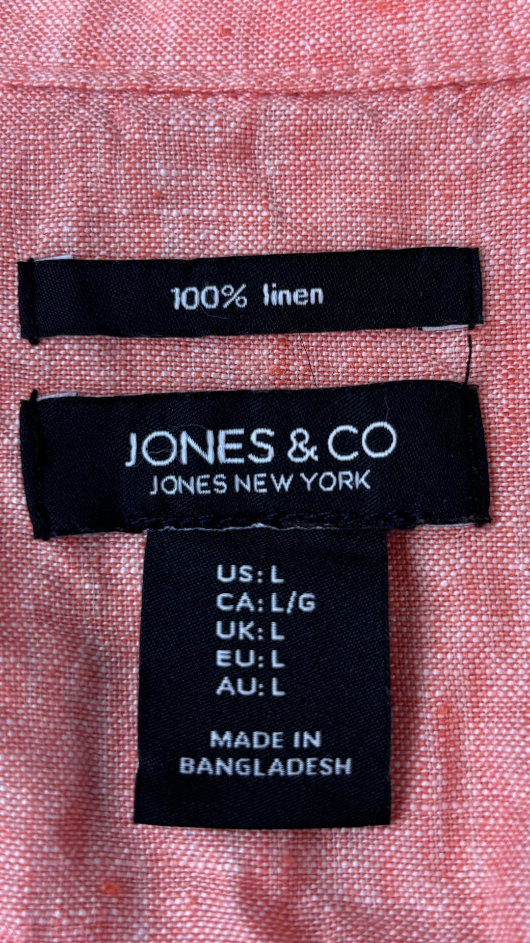 Veste corail en lin Jones& Co taille large. Vue de l'étiquette.